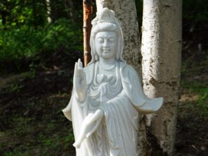 Kwan Yin marks the centre of the gardens and retreat.